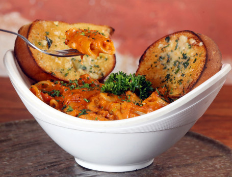 Penne Pasta In Red Sauce With Garlic Bread