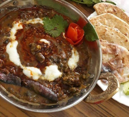 Dal Makhani With 2 Butter Tandoori Roti