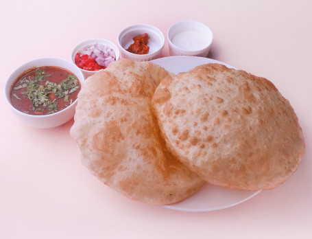 Chhole Bhatura Thali (One Piece Of Chole Bhature Served And Aloo Chana Palak With Salad, Pickle, Mouth Freshener)