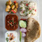Veg. Thali Daal+Kadaiee Paneer+Raitaha+2 Spl.tva+1 Dessert+1 Lachha Prant Chpati+Rice+Green Salad
