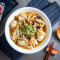 Suān Là Tāng Jiǎo Dumplings i sur og krydret suppe