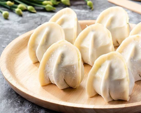 Jiǔ Cài Shēng Xiān Shuǐ Jiǎo Uncooked Chive Dumplings