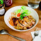 fēng mì dà suàn bā xī lǐ jiān jī tuǐ fàn Pan fried chicken thigh with garlic, honey, parsley bento.