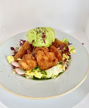 Chicken Schnitzel Caesar Salad With Avocado And Mixed Seeds