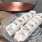 shǒu gōng yú jiǎo Handmade Fish Dumpling