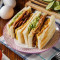 gù xiāng de là wèi zhū pái dàn tàn kǎo sān míng zhì Spicy Pork Chop Egg Charcoal Roasted Sandwich