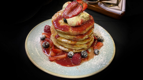 Pancake Stack With Berry Compote And Whipped Cream