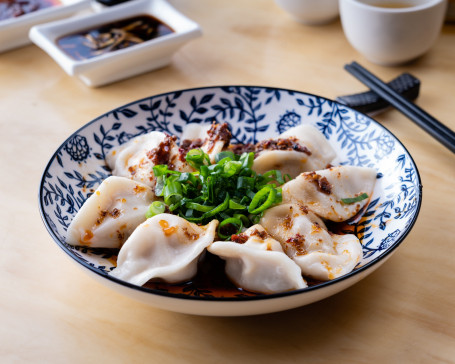 Pork And Vegetable Dumplings With Hot Chilli Sauce