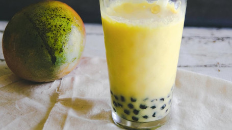 G13. Passion Fruit Tea With Boba Popping Boba Bǎi Xiāng Guǒ Shuāng Xiǎng Pào