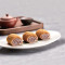 Gōng Tíng Lǘ Dǎ Gǔn Red Bean Glutinous Rice Roll Topped With Peanut