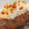 Loaded Baked Potato With Cheese, Bacon, And Green Onions