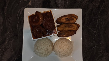 White Rice, Red Stew, And Plantain With Assorted Organ Meat