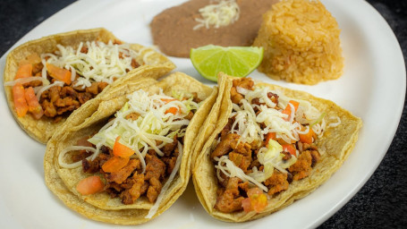 Tres Tacos Con Arroz Y Frijoles Combo