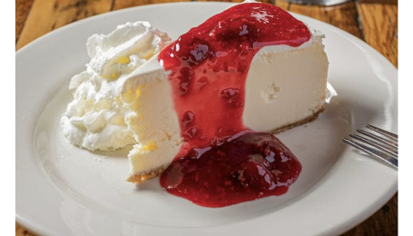 Supreme Cheesecake With Raspberry Sauce