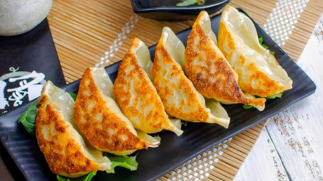 A6. Pork Gyoza A6. Zhū Ròu Jiǎo Zi