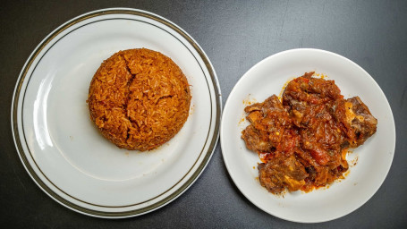 Oxtail Stew With White Rice Or Jollof Rice