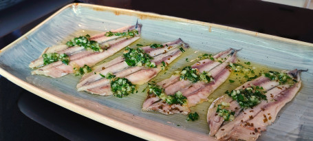 Marinated Anchovies With Garlic And Parsley Dressing
