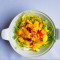 Citrus Segment Salad On Mix Leaves And Mustard Dressing
