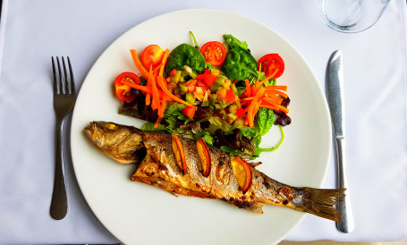 Whole Sea Bass On The Back With Fresh Mediterranean Salad