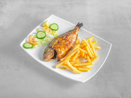 Grilled Fish Sea Bass (Bones) With Fries (Chips) سمك باس البحر مشوى مع رقائق البطاطس المقليه