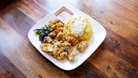 Hometown Fried Chicken Chops on Chicken Rice and Fried Egg