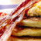 2 Pancakes With 2 Strips Of Bacon