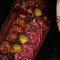 Charkbricka med iberico pata negra, jamon serrano, salchichon, chorizo, manchego ost (6 mån) och marques curado