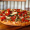 10 Individual Raging Veggie Pizza