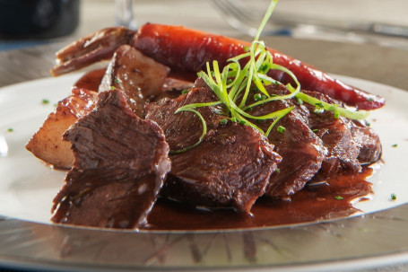 (Signature) Slow-Braised Beef Cheeks Màn Zhǔ Niú Miàn Jiá