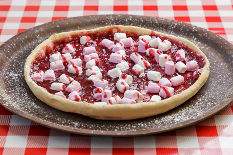 House Made Berry Coulis And Marshmallow Dessert Pizza