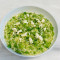 Pea gremolata risotto with crumbled Greek style cheese, chives Parmesan
