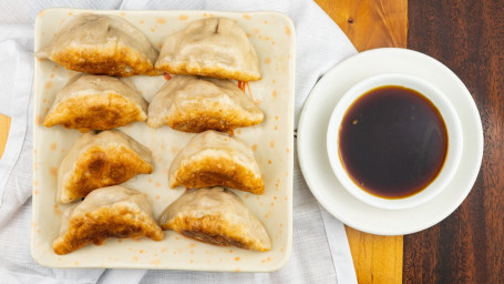 A08. Fried Dumplings (8 Pieces)