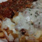 Shrimp Parmigiana with side of mostaccioli.