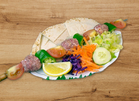 K01A Tomato Lamb Kebab With Rice Or Chips Or Salad