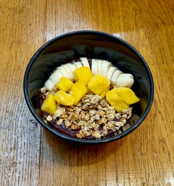 Acai, Fresh Apple Juice, Fresh Strawberry, Fresh Blueberry And Granola Served With Cacao Nibs.