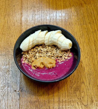 Dragon Fruit, Apple Juice, Fresh Blueberry, Fresh Banana And Granola Served With Coconut Flakes