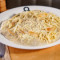 Spaghetti ao molho 4 queijos com iscas de frango