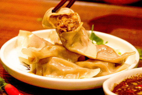 Little Lamb Dumplings (8 Pieces Huí Xiāng Yáng Ròu Shuǐ Jiǎo (8Jiàn