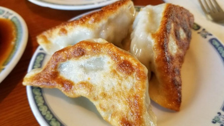 403. Pan-Fried Pork Dumplings (3 Pcs)