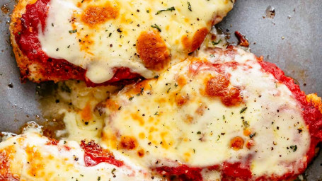 Side Crispy Chicken Tenders With Marinara Sauce And Parmesan Cheese