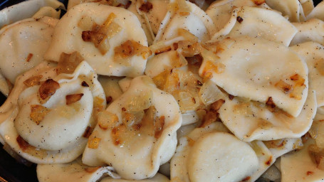 Potato Pierogi With Sautéed Onions Apple Sauce