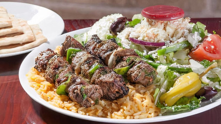 Steak Skewers With Rice Greek Salad Dinner