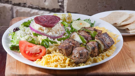Steak Skewers With Rice Greek Salad