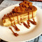 Luxury Vanilla Cheesecake topped with Lotus Biscoff