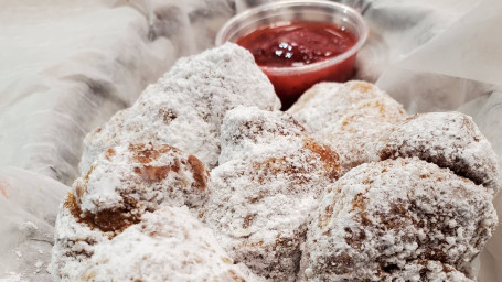 Powdered Sugar Knots With Strawberry Sauce